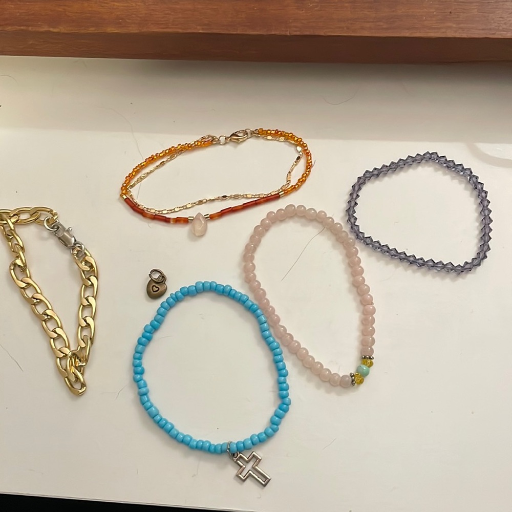 Lot of 5 bracelets and a charm